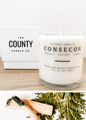 Open image in slideshow, Consecon hand-poured palo Santo, white cedar, and camphor premium soy candle in a clear glass jar made by The County Candle Co.  Hand-poured and made from 100% premium soy wax, cotton wicks, and phthalate-free fragrances infused with essential oils, we pride ourselves on creating luxurious candles using time-honored technique and eco-conscious materials. Made in Prince Edward County, Ontario, Canada. 
