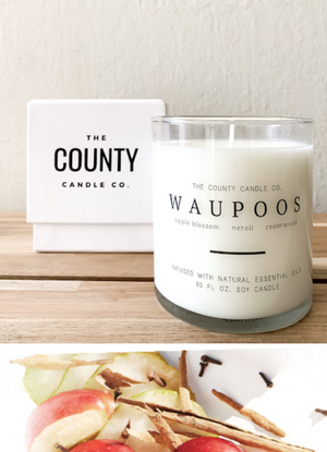 Open image in slideshow, Waupoos hand-poured apple blossom, neroli, and cedar wood premium soy candle in a clear glass jar made by The County Candle Co.  Hand-poured and made from 100% premium soy wax, cotton wicks, and phthalate-free fragrances infused with essential oils, we pride ourselves on creating luxurious candles using time-honored technique and eco-conscious materials. Made in Prince Edward County, Ontario, Canada. 
